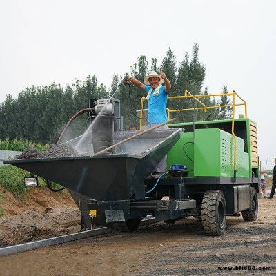 鸿信轮式路缘石滑模机 公路拦水带成型机 自走式路沿石滑模机